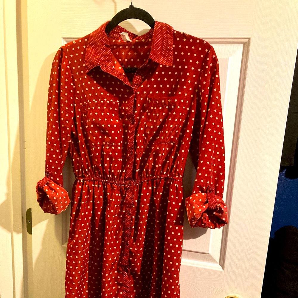 Red polka dot, long sleeved dress.